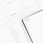 an array of organization tools like planners and notepads