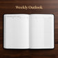 An open weekly outlook planner spread on a dark wood background, with the words 'Weekly Outlook' printed above in gold.