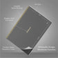 Black notebook with gold foil detail on a gray background, showing dimensions and features.
